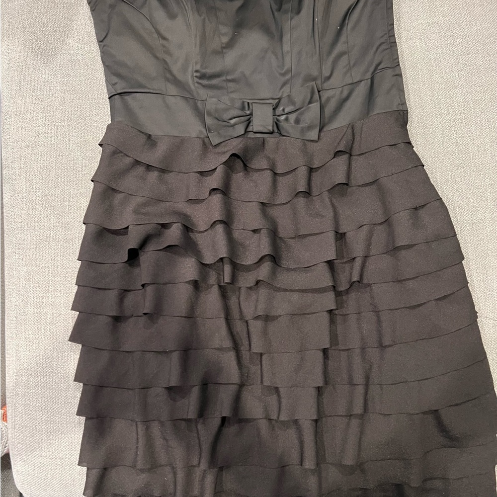 Stylish H&M cocktail party dress. New with Tags. Looks great.